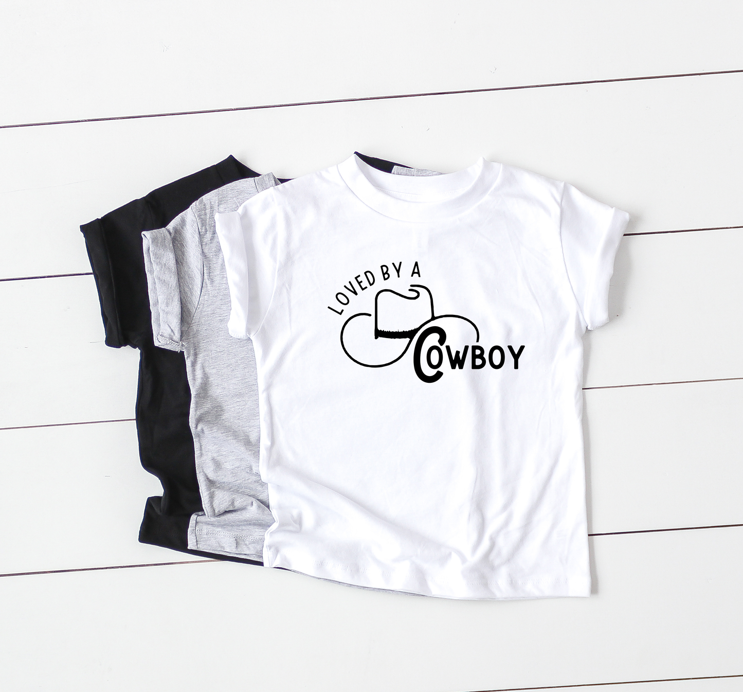 Loved by a Cowboy - Toddler Tee